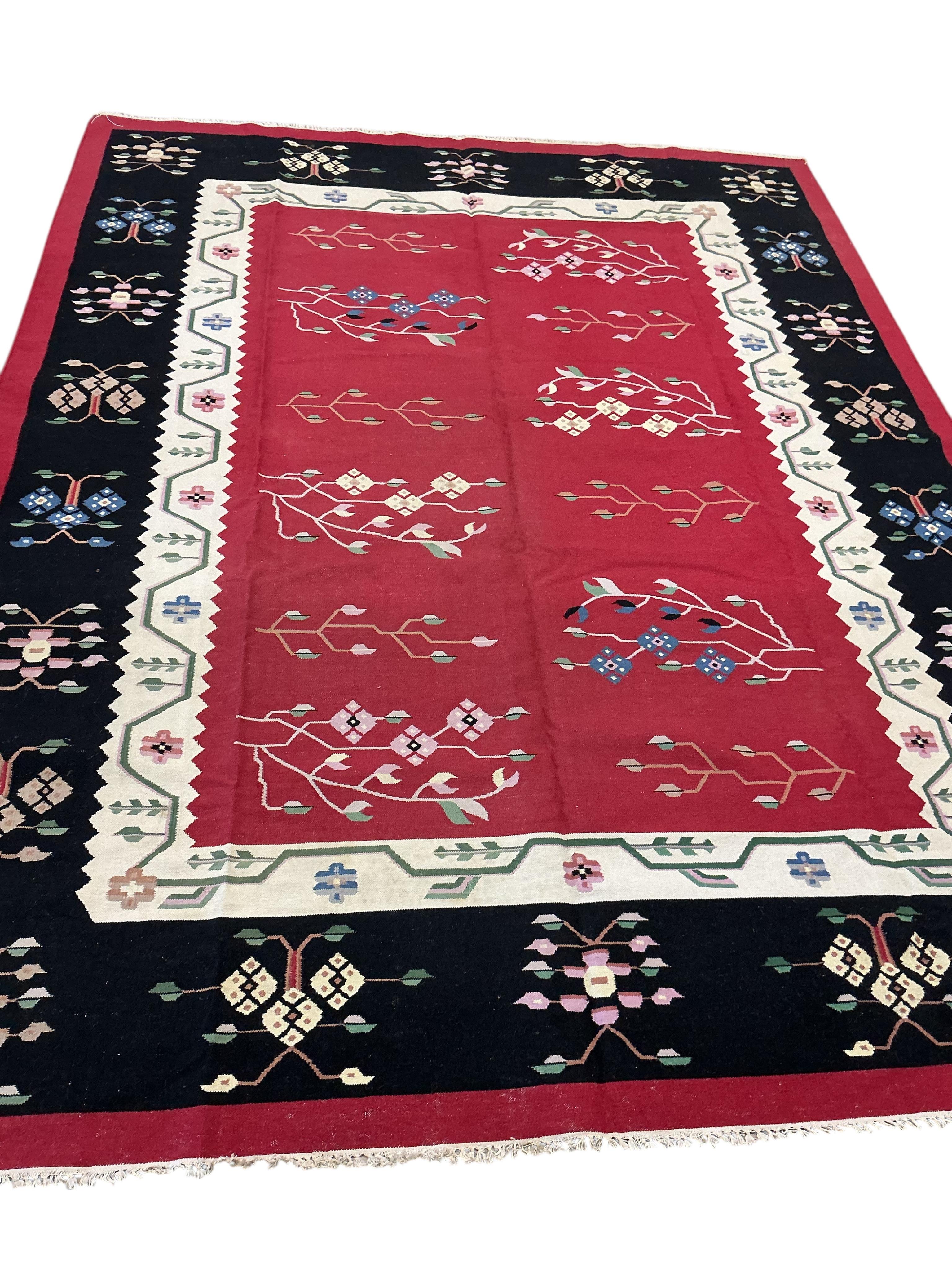 An Arabian design Kilim, 300 x 277cm